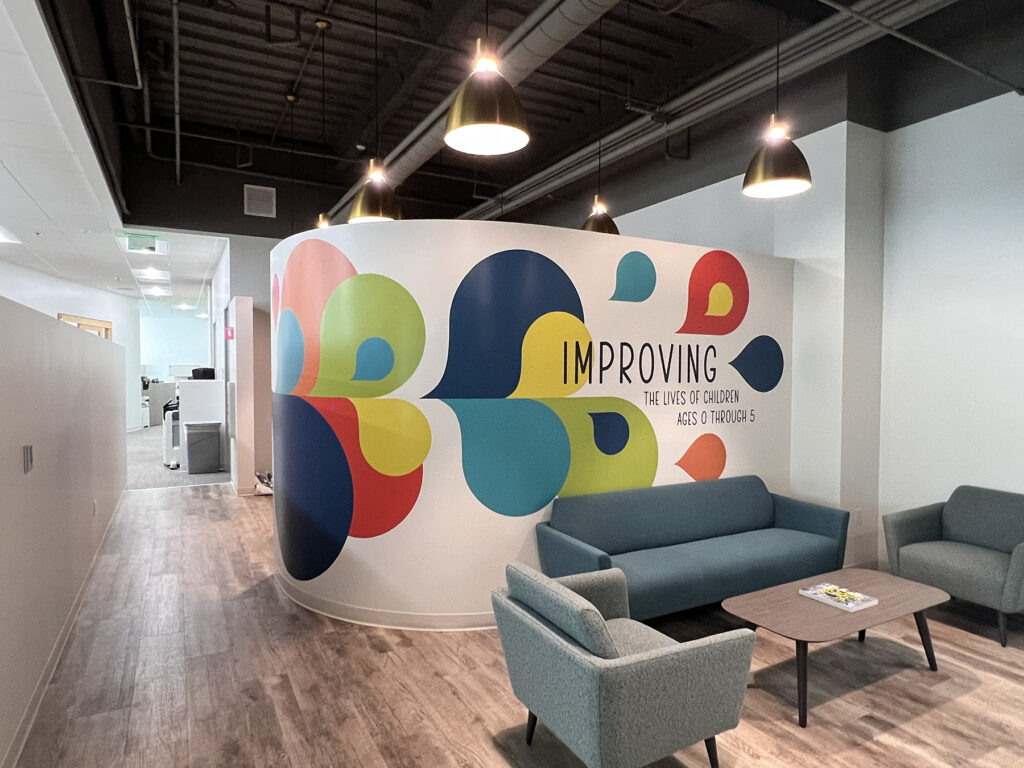 Custom wall murals and graphics in an office setting.